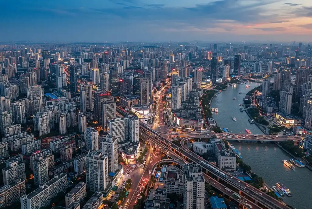 Aerial view of a dense modern megacity with high-rise buildings, roads, and urban infrastructure